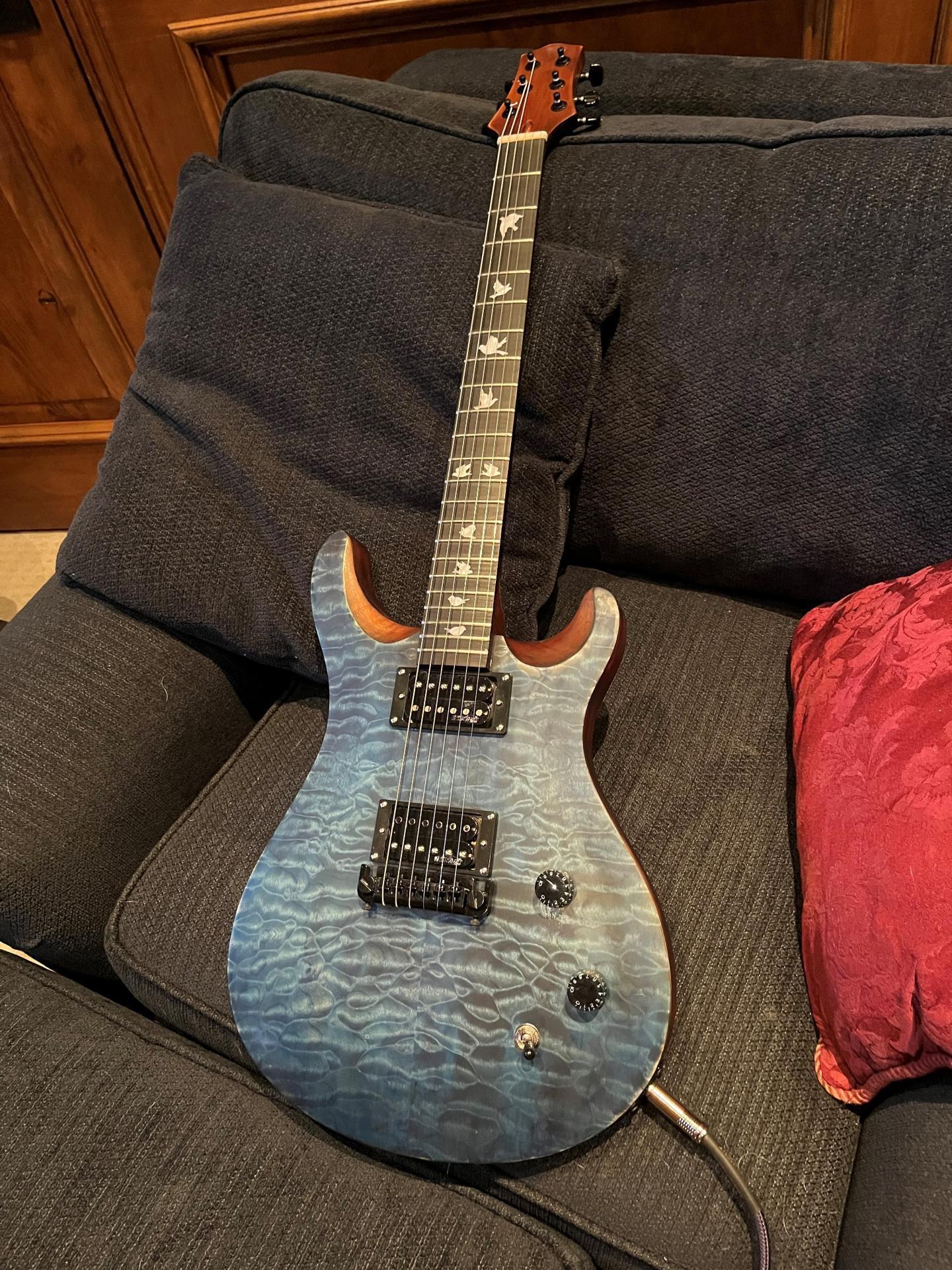 Finished PR style guitar kit with quilted maple veneer built by customer Ivan Smallwood